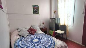 Voodi või voodid majutusasutuse BVC Hotel Iquique Cavancha toas