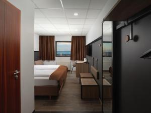 Кровать или кровати в номере Hotel Cabin