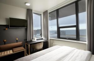 Кровать или кровати в номере Hotel Cabin +30 фотографий