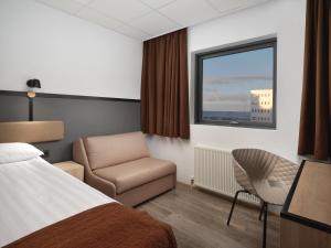 Кровать или кровати в номере Hotel Cabin