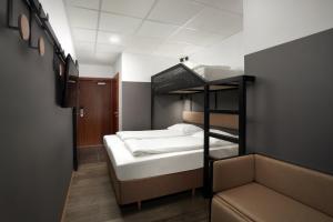 Кровать или кровати в номере Hotel Cabin