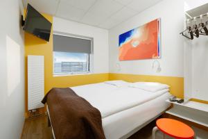 Кровать или кровати в номере Hotel Cabin