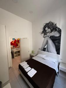 Un pat sau paturi într-o cameră la Niki Home