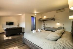 Postel nebo postele na pokoji v ubytování Hotel Montmar