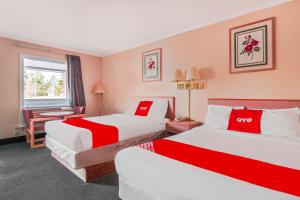 Postel nebo postele na pokoji v ubytování OYO Hotel Durham West Hills