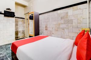 Postel nebo postele na pokoji v ubytování OYO Hotel Dreamland