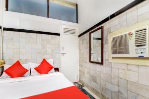 Postel nebo postele na pokoji v ubytování OYO Hotel Dreamland