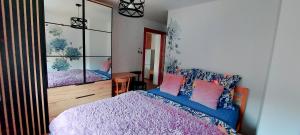 Postel nebo postele na pokoji v ubytování Dom przy świerku