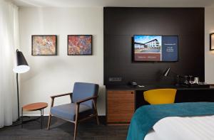 Una cama o camas en una habitación de Hotel Örk