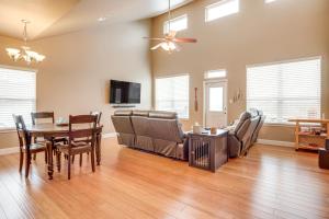 a dining room and living room with a table and chairs at 6 Mi to Water Spacious Canyon Lake Home in Canyon Lake