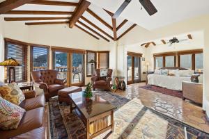 a large living room with a bed and a couch at H1786 - Hamilton Cove Villa 17-86 in Avalon +18 photos