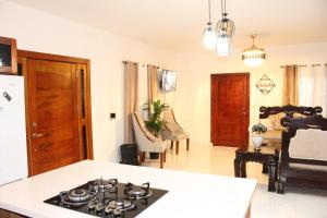 キャバレテにあるVilla luxury Cabareteのキッチン(コンロ付) +13枚の写真