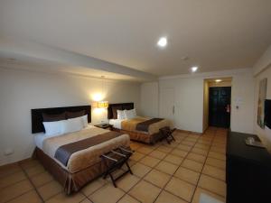 Postel nebo postele na pokoji v ubytování Bella Luxury Suite in Coronado + 37 fotografií