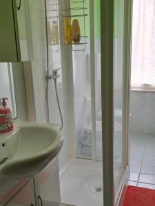 A bathroom at Appartamento Via Bixio Még 25 kép