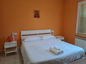 A bed or beds in a room at Appartamento Via Bixio