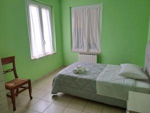 A bed or beds in a room at Appartamento Via Bixio