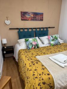A bed or beds in a room at ORTIGIA 26