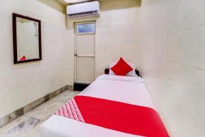 Postel nebo postele na pokoji v ubytování OYO Hotel Dreamland