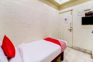 Postel nebo postele na pokoji v ubytování OYO Hotel Dreamland