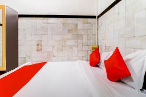 Postel nebo postele na pokoji v ubytování OYO Hotel Dreamland