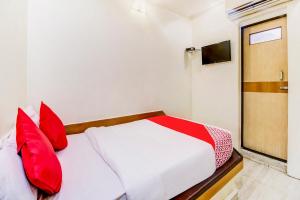 Postel nebo postele na pokoji v ubytování OYO Hotel Dreamland