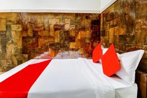 Postel nebo postele na pokoji v ubytování OYO Hotel Dreamland