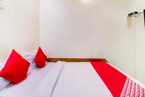 Postel nebo postele na pokoji v ubytování OYO Hotel Dreamland