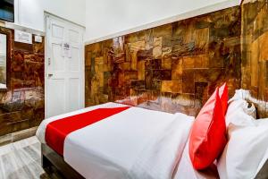 Postel nebo postele na pokoji v ubytování OYO Hotel Dreamland