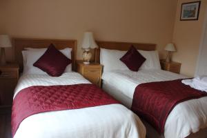 Postel nebo postele na pokoji v ubytování Carrowntober House B & B
