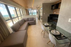 Uma área de estar em Reserva Madero Loft Natal Hotel
