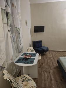 TV a/nebo společenská místnost v ubytování Dolce Dormire + 19 fotografií