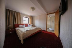 Ліжко або ліжка в номері Hotel Zur Traube