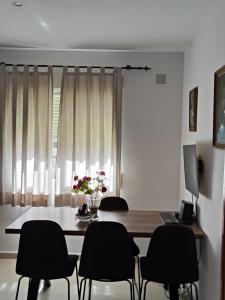 A television and/or entertainment centre at Relax en la playa Még 37 kép