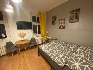 Postel nebo postele na pokoji v ubytování Magnolia Rooms Plus