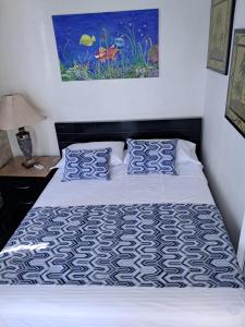 En eller flere senge i et værelse på Apartamento Boutique Cartagena + 21 billeder