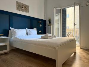 A bed or beds in a room at B&B Boutique Two Bedrooms Apartments