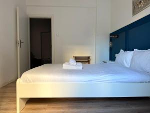 A bed or beds in a room at B&B Boutique Two Bedrooms Apartments