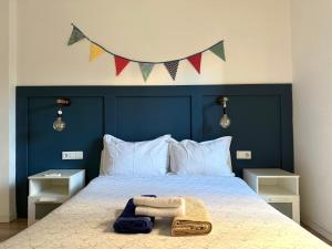 A bed or beds in a room at B&B Boutique Two Bedrooms Apartments