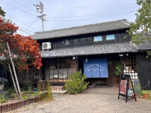 a house with a sign in front of it at Hillshouse2 - Vacation STAY 67982v in Tokoname