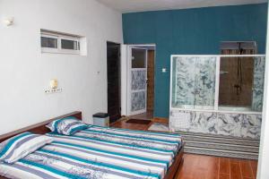 Alifa tankpè calavi 3 CH客房内的一张或多张床位