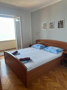 Postel nebo postele na pokoji v ubytování Apartments Šimić