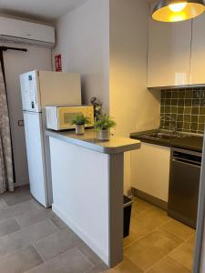 Kuchyň nebo kuchyňský kout v ubytování Siestamar Beach Apartment, refurbished, renové, renovado 2025