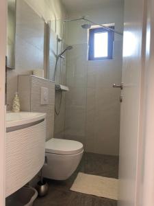 Koupelna v ubytování Apartments Šimić