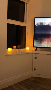 TV a/nebo společenská místnost v ubytování The Farmers House