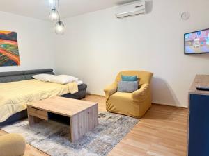 Un televizor și/sau centru de divertisment la Apartments Nives