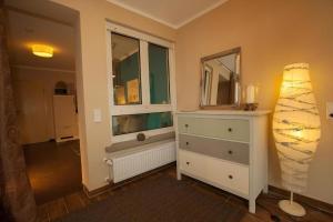Postel nebo postele na pokoji v ubytování Schiefer Blick, Wohnung Mit Terrasse Und Balkon