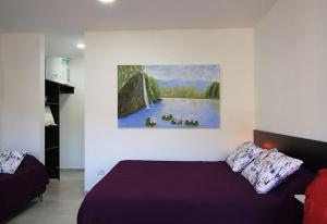 Una cama o camas en una habitación de Espacio Zen Deros