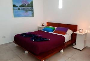 Una cama o camas en una habitación de Espacio Zen Deros