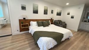 Postel nebo postele na pokoji v ubytování Hygge Hus Hotel
