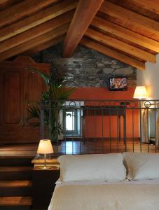 Un pat sau paturi într-o cameră la Hotel Ad Gallias
